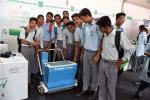 Students of Navyug School, New Delhi, with a Model of Wrapper Picker displayed  in the Exhibition during Swachhta Pakhwada